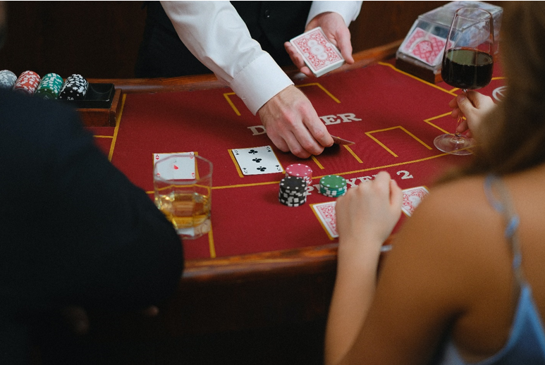 What is the impact of popular casino games like baccarat and the gambling industry on the UK economy? 