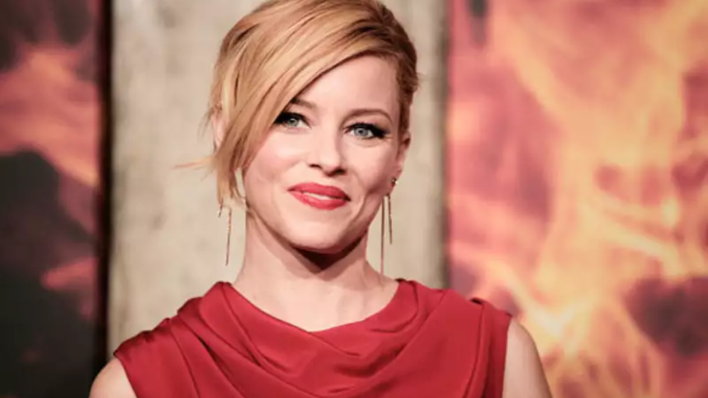When Elizabeth Banks Arrives in Greece for Vacation, She Slips Into a Cherry Print Bikini
