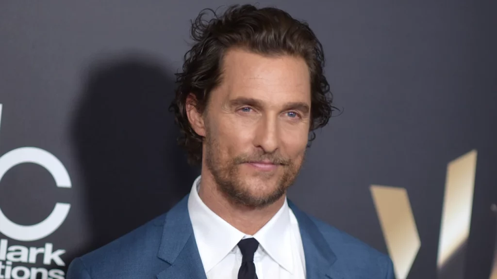 Matthew McConaughey Leads a Group Through Los Angeles While Filming Salesforce Commercial