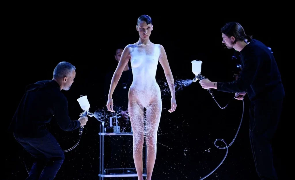 Bella Hadid Went Topless, Gets Spray-On Dress During Paris Fashion Week