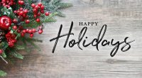 happy holidays text christmas evergreen branches red winter holiday berries corner over rustic wooden background 203494899