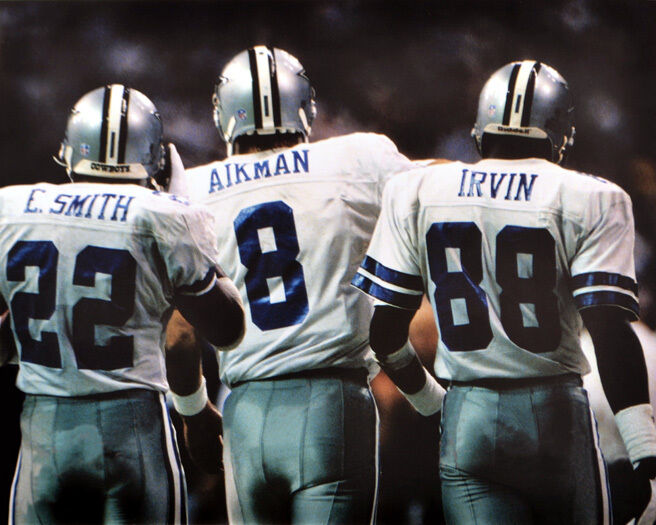 Michael Irvin formed an unstoppable trio with quarterback Troy Aikman and running back Emmitt Smith.