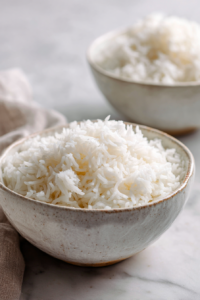 Divide the cooked rice between serving bowls.